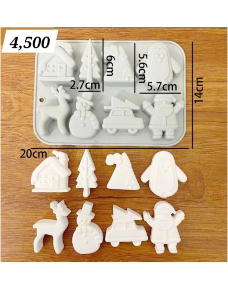 8 figuras navideñas (casa, pingüino, reno, carro, etc.)